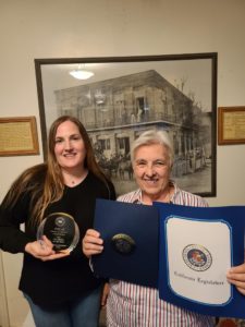 Melissa Hamre and Christine Albertine accept award